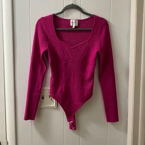 Brand new tried on .. sanitary tags still on button bodysuit pink rib stretch